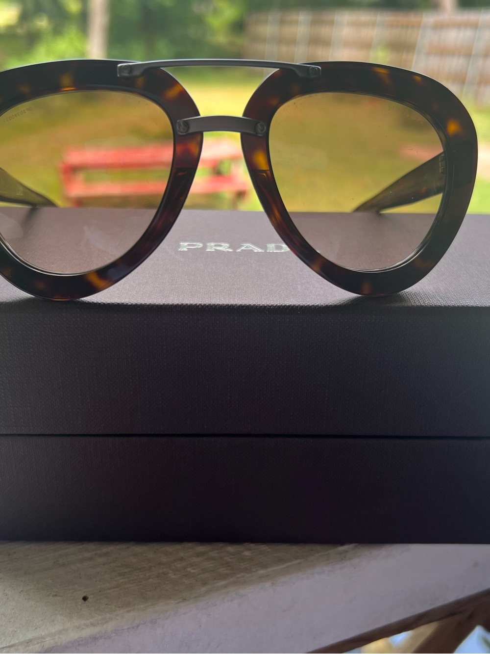 Prada Tortoiseshell Frame Sunglasses with Brown Gradient Lenses